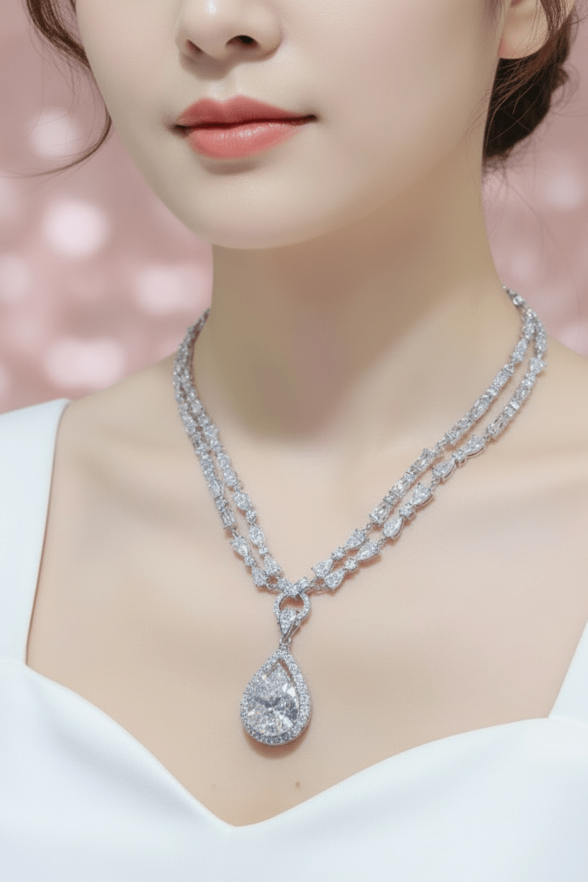 Silver necklace with a teardrop pendant