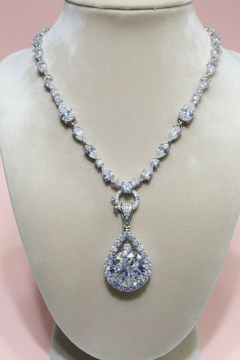 Silver necklace with a teardrop pendant 